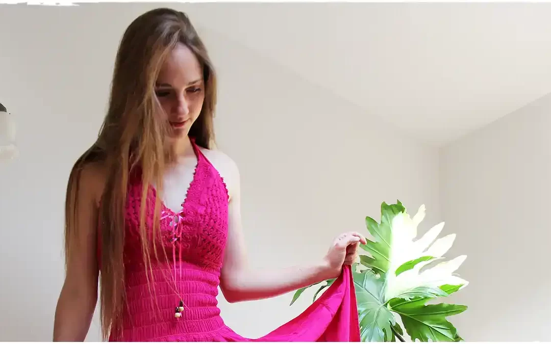 Bohemian dresses: beautiful blonde woman in pink sleeveless summer dress