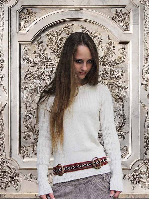 White Peruvian Alpaca Sweater Matched with Ethnic Belt Worn by a Girl with Long Blonde Hair